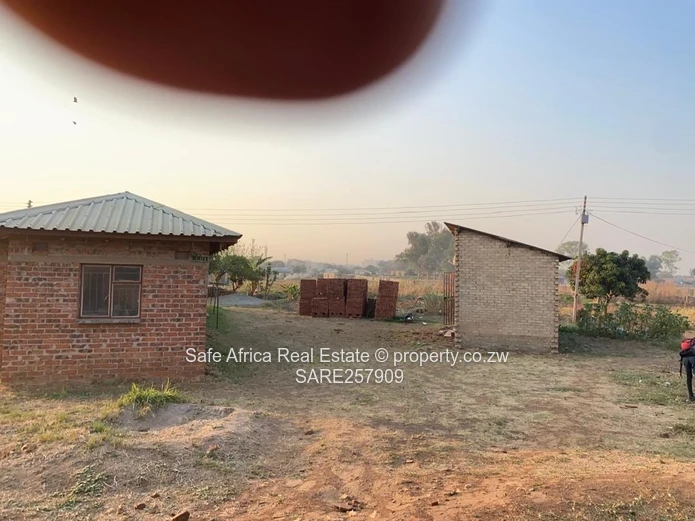 BUDIRIRO 5B TWO-ROOMED CORE-HOUSE-ON SERVICED STAND FOR SALE. Priced at US$