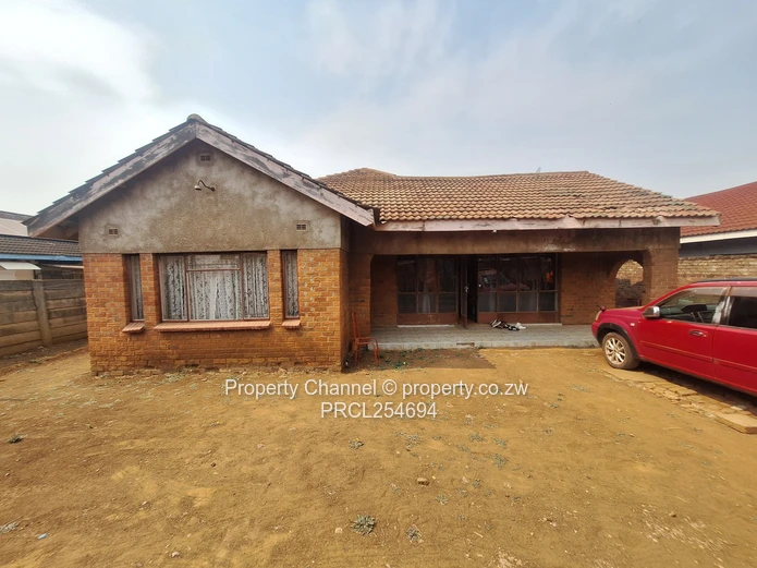 Solid 4-Bedroom Brick Home with Potential
