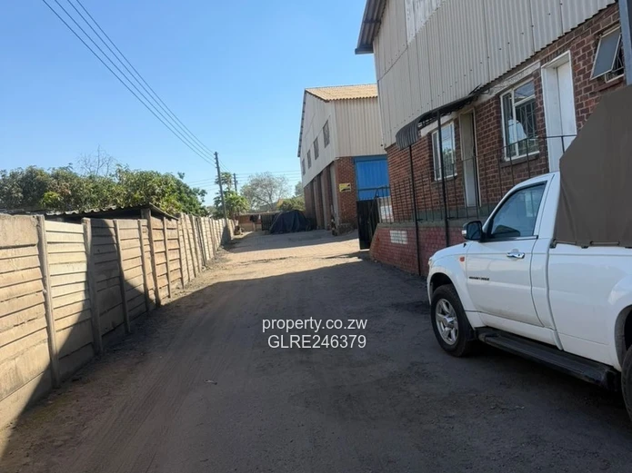 360sqm Ardbennie Warehouse for Rent — Roller Doors & Borehole
