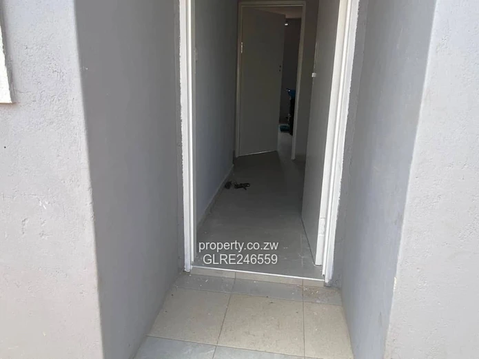For Sale 4-Bed 2 Apartments Townhouse Complex in Budiriro Cabs  - Walled, Paved, Fitted Kitchens