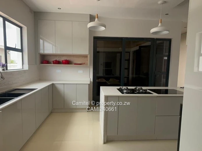 4beds all en-suite ,borehole,swimming pool sitting on 540sqm and title deed