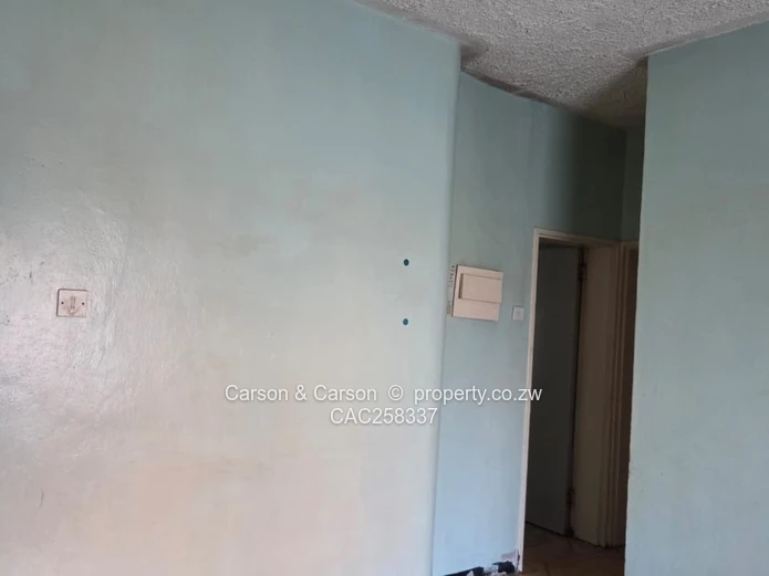 Mufakose 2 bedroom flat lounge fitted kitchen combined toilet and bathroom on ground floor 