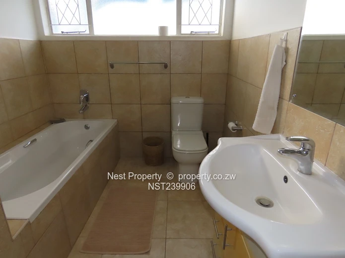 Neat, Embassy Style Home located in the heart of Gunhill!