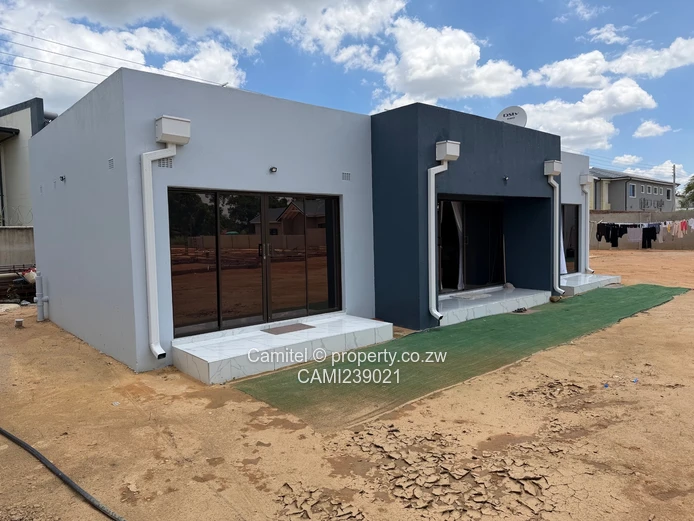 2100sqm Arlington stand with modern 2 bed cottage,gated community with clean title deed (Sole Mandate)