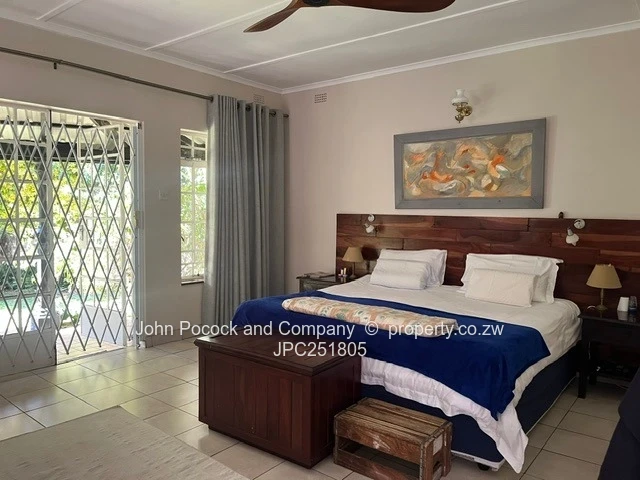 Furnished 4-Bed Burnside Home with Pool & Lush Garden