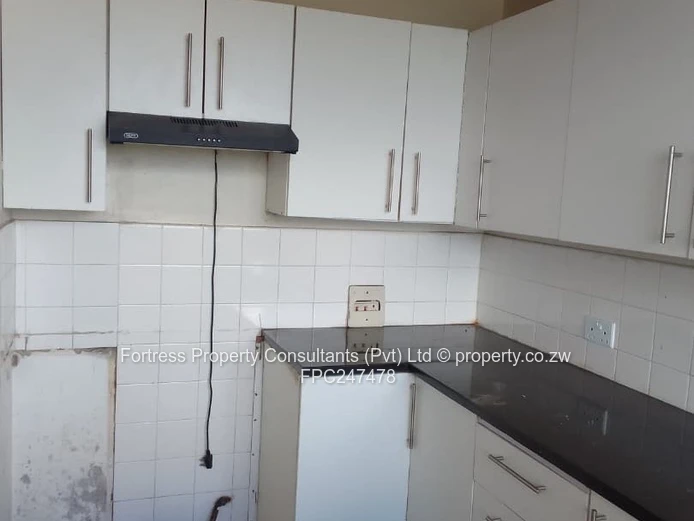 Sunlit 2-Bed Avenues Flat with Balcony & Borehole
