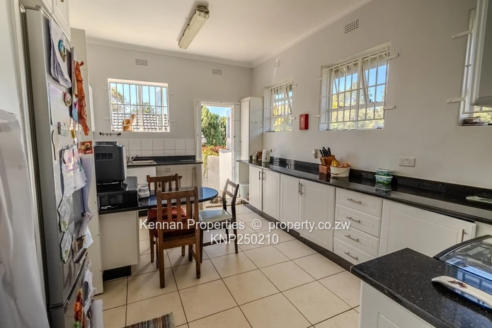 Attractive five bedroom home on two and a half acres. Good water and Msasa trees. (Sole Mandate)