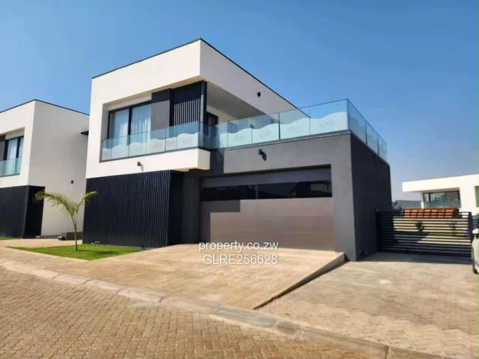 Borrowdale: Modern 4-Bed Apt w/ Glass Balconies & Borehole