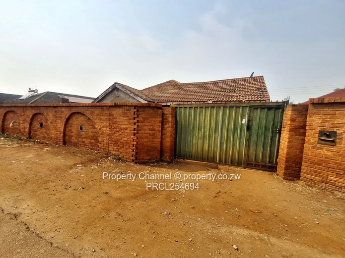 Solid 4-Bedroom Brick Home with Potential