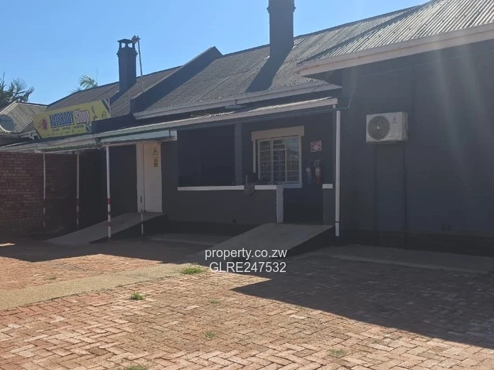 Harare CBD Office: Secure Walled Property with Paved Yard