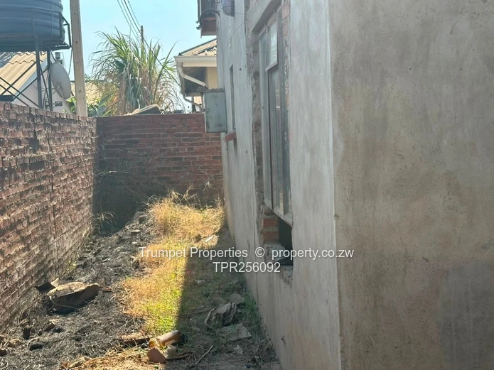 Unfinished 4BR Brick Home with Verandah in Budiriro, title deeds