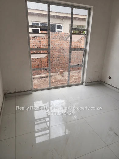 Emerald Hill: New 3-Bed Townhouse Complex w/ Borehole