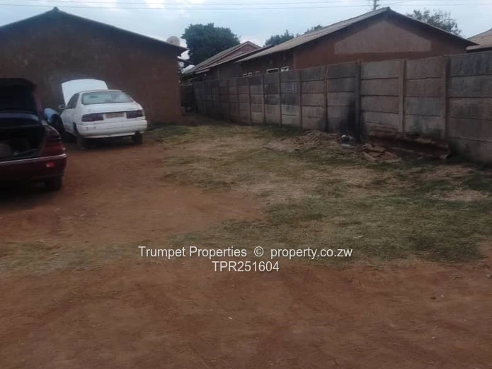 2-Bed Dzivarasekwa Ext— Walled 3 sides Yard, Parking, Sewer, Good ZESA