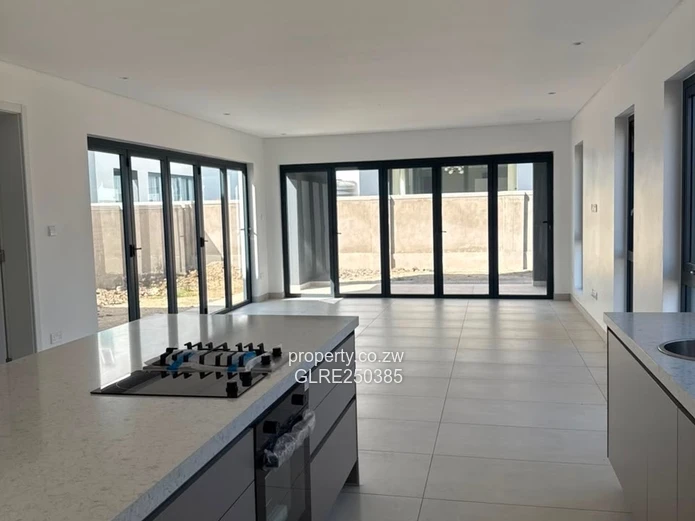 Contemporary 4-Bed Borrowdale Apt — Balcony & Borehole