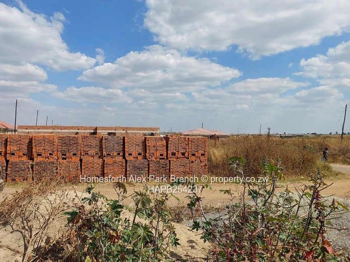 A vacant stand in a built up area ...