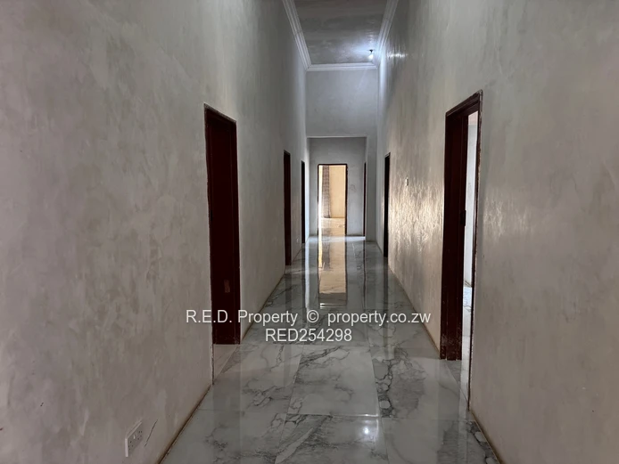 Luxury 7-Bedroom Residence with Exceptional Finishing Potential In Matsheumhlope!