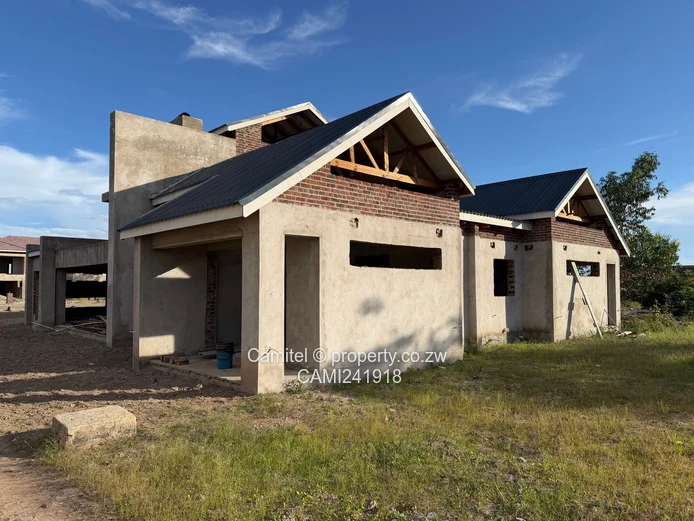 Incomplete 4 Bed double storey with a 3 bed cottage with title deed