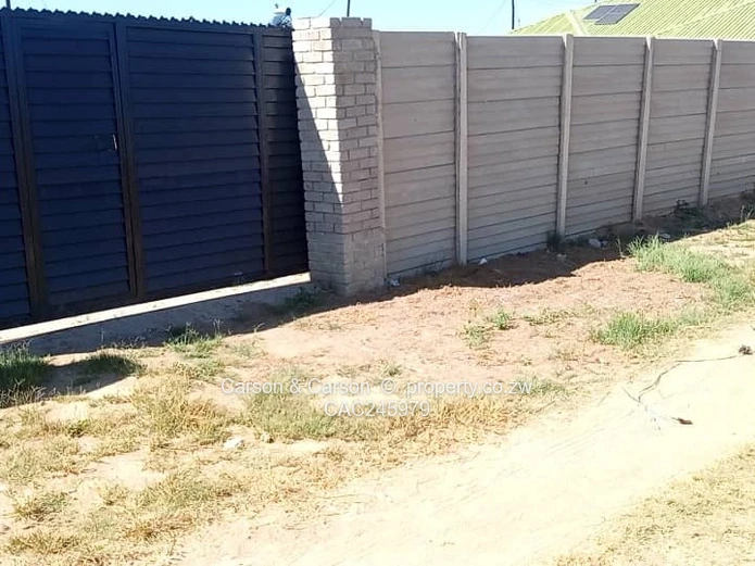 Secure Walled 450m² Stand with Gate on Gravel Road, Chitungwiza