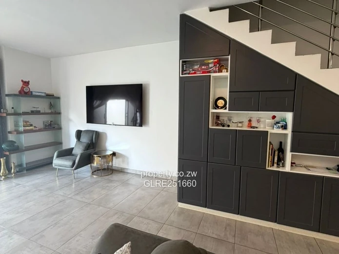 Modern 4-Bed Avondale Apt — Pools, Gym & Borehole
