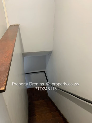 Harare CBD 2-Bed Garden Flat — Updated Kitchen & Borehole