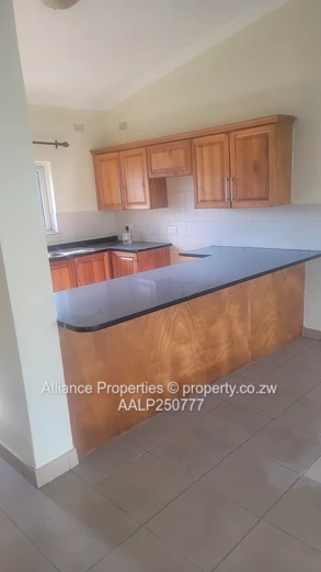 Spacious 2-Bed Ground Floor Flat with Borehole & Garden