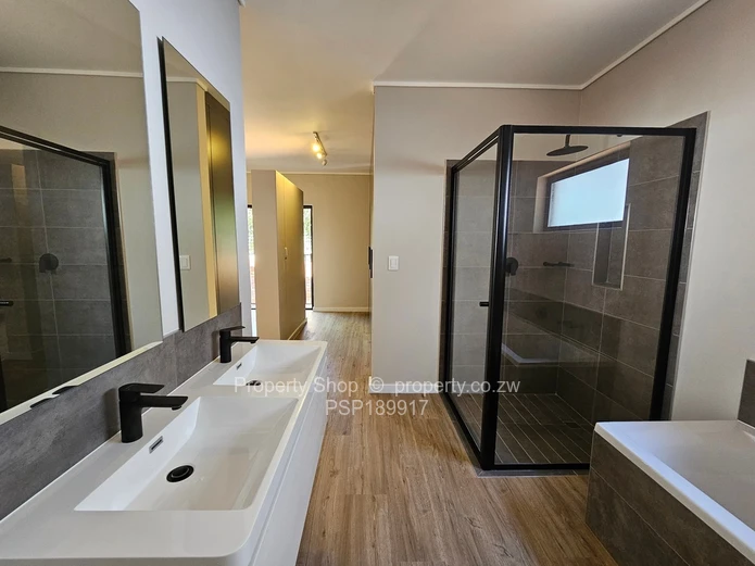 Invest in South African Property! Beautiful duplex in Sandton. Spacious, Modern and Secure.