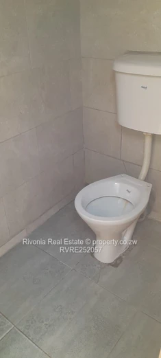 2-Bed Tiled Home with Walled Yard & Access Control