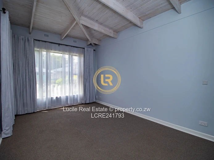 Seamless Living: A Cozy Indoor-Outdoor Retreat in Borrowdale