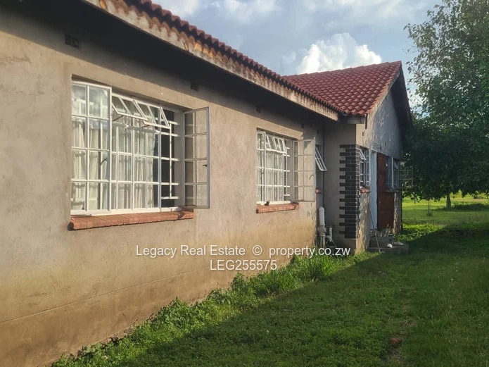 Marlborough 4-Bed Townhouse Complex with Charming Archways & Borehole