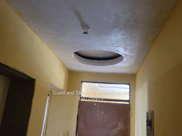 A neat 7-roomed, 4-bedroom house sitting on 200m², ideal for a family or as an investment property.