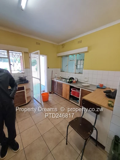 4-Bed Hillside Home on 1,237m² with Borehole & Garage