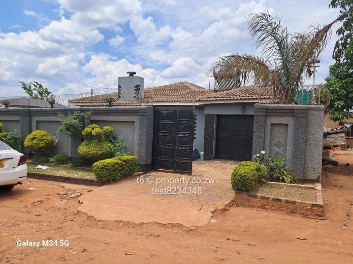 Spacious 4-Bed Home in Marimba Park — Garage & Fitted Kitchen