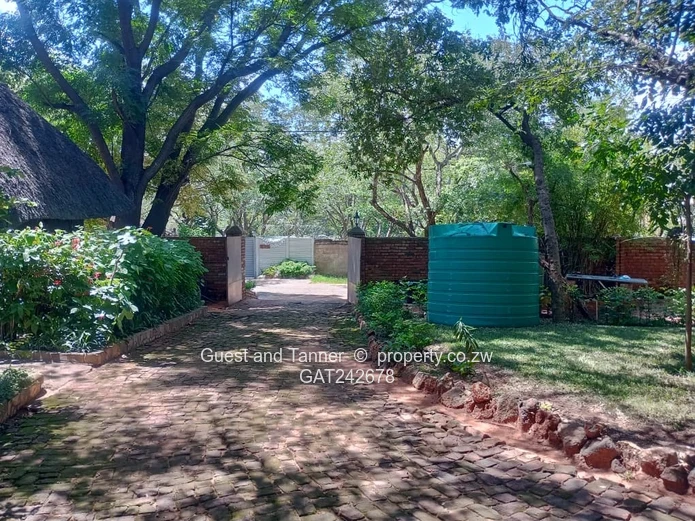 Ten bedroomed lodge under thatch for sale 