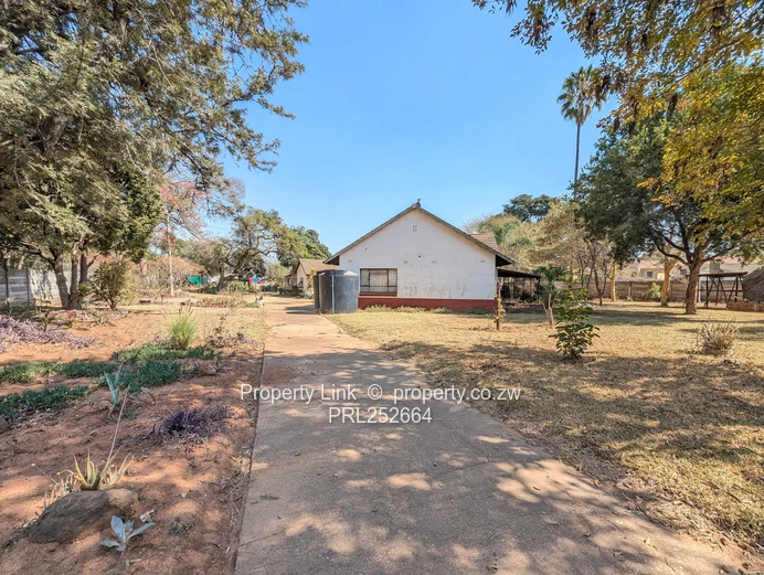 Reduced to Sell! - Double Entrance Corner Property With Potential