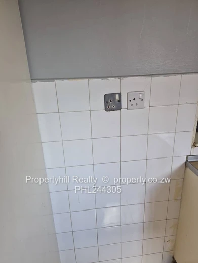 Harare CBD Avenues: 2-Bed Flat 80sqm — Borehole & Paved Yard (Sole Mandate)