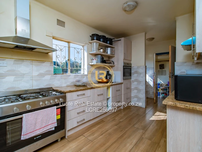 Spacious 4,100sqm Estate: Double-Storey Family Home 