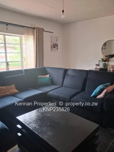 Secure 2-bedroom flat close to Avenues Hospital and Shops.