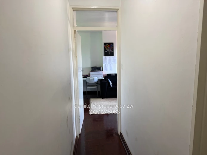 Chinamano Heights:Parquet-Floored 2-Bed Avenues Flat with Borehole (Sole Mandate)