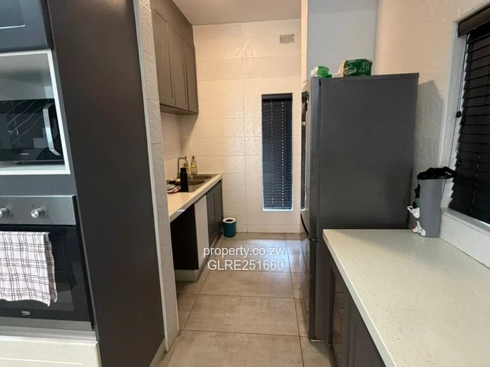 Modern 4-Bed Avondale Apt — Pools, Gym & Borehole