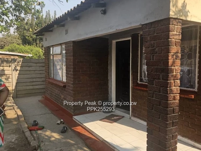 11-Bedroom Brick Home in Mbare — Walled, Main Road Deeds available