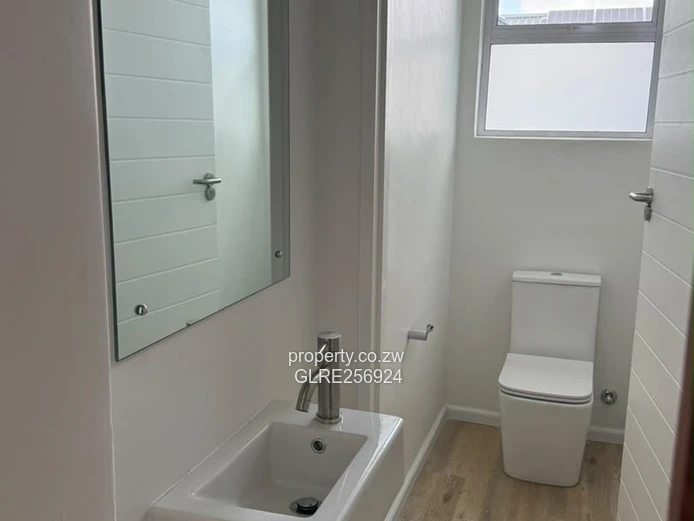 Modern 3-Bed Flat in Borrowdale with Verandah & Solar
