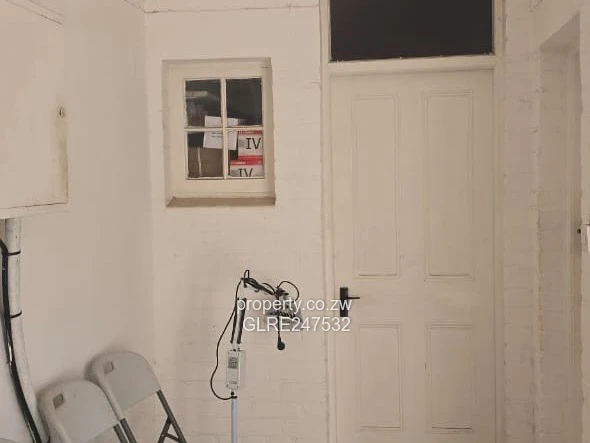 Harare CBD Office: Secure Walled Property with Paved Yard