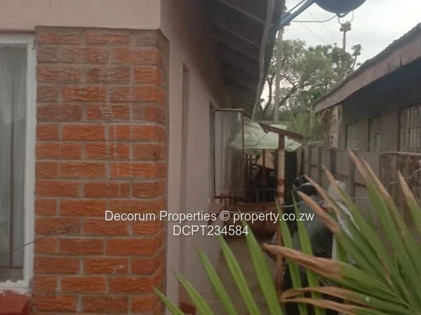Brick-Front 4-Bed Walled Home in Ruwa — Tiled Floors