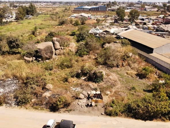 Build a mega factory or warehouse on this huge piece of land in Msasa