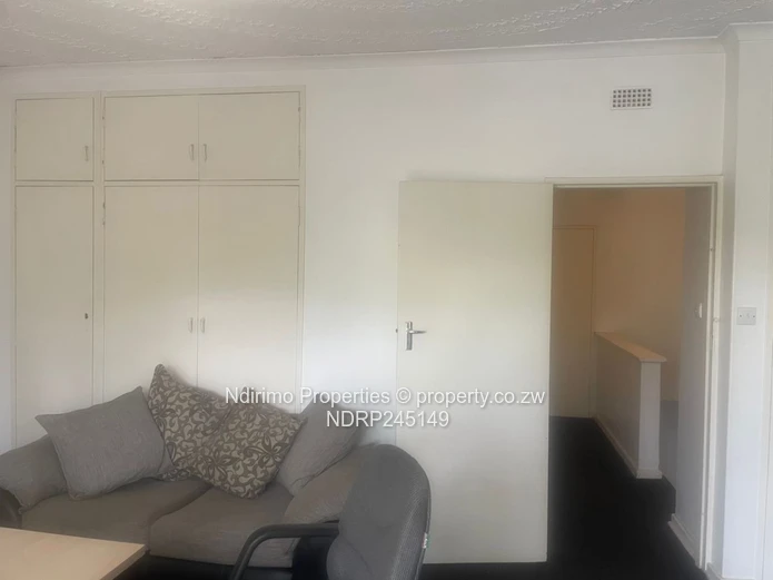 Secure 2-Bed Harare CBD Flat with Balcony, Garden & Modern Kitchen