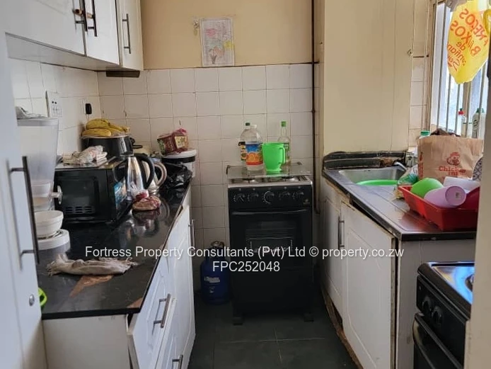 Sunlit 2-Bed Flat in Avenues CBD — Borehole (Sole Mandate)