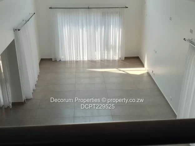Spacious 4-Bedroom Double- storey Home with Borehole in Borrowdale for Rent!
