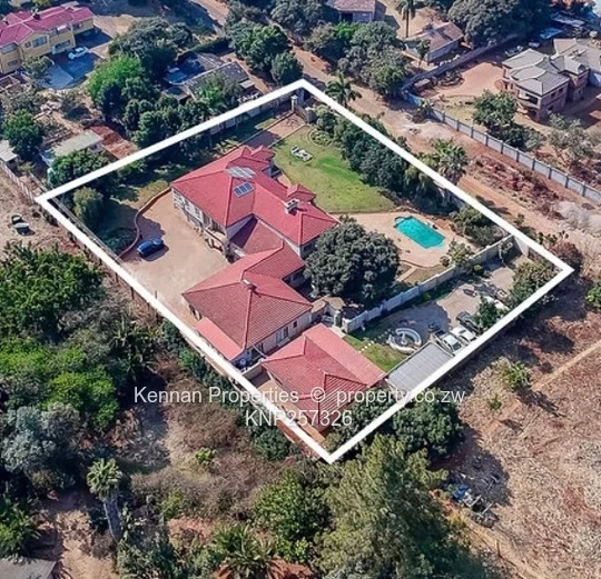  Charming 7 Bedroom Double Storey Home with a 5 Bedroom Cottage on 1 Acre