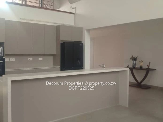 Spacious 4-Bedroom Double- storey Home with Borehole in Borrowdale for Rent!