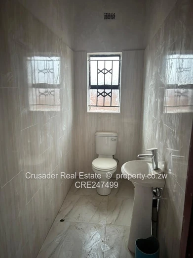 Modern 2-Bed Flat in Tynwald — Borehole & Built-ins (Sole Mandate)